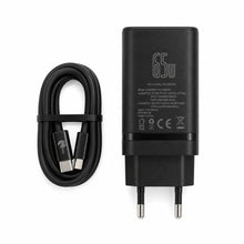 Black 65W USB-C power adapter with a European plug next to a matching black USB-C cable 