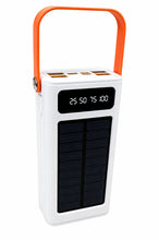 A white portable power bank with an orange handle and a black solar panel on the front, featuring a digital display showing battery percentages.