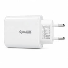 A white Superlink travel adapter charger 